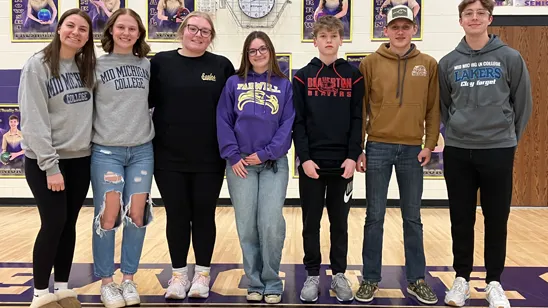 Students from Farwell and Beaverton High Schools are awarded Tailgate Toss Scholarships.
