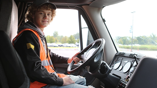 CDL student driving the practice truck