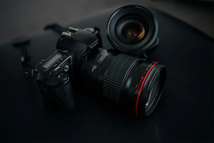 professional camera sitting on table