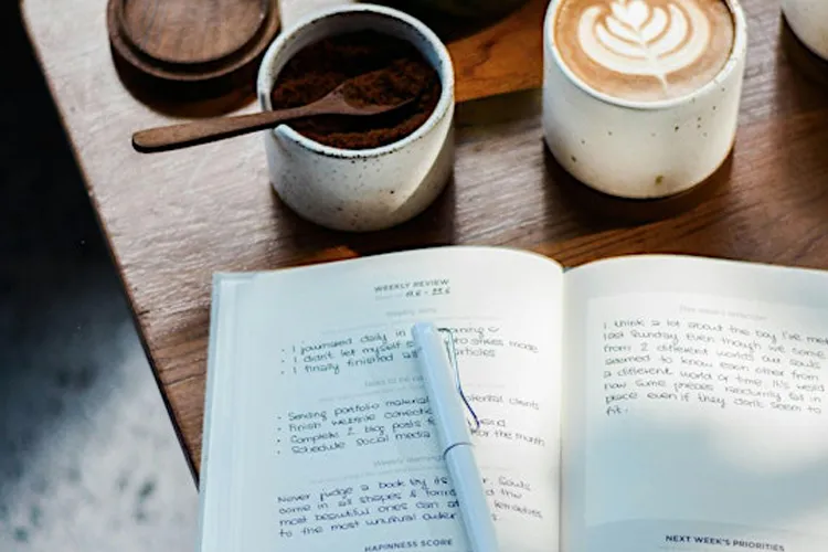 Journal with Cup of Coffee
