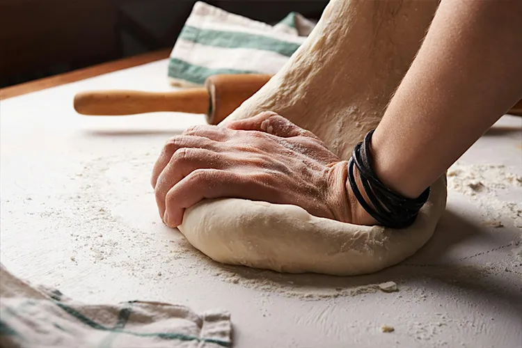 Person making bread