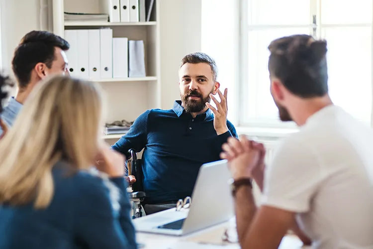 People talking in office space