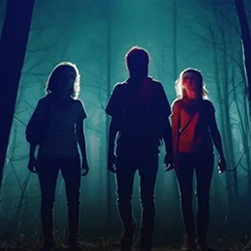 Group of people in haunted forest.