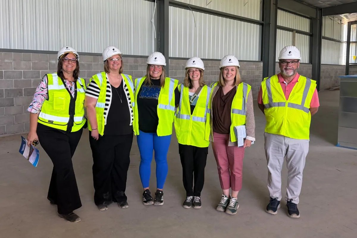 MACVB representatives meet with the Mid Foundation at the Event Center construction site.