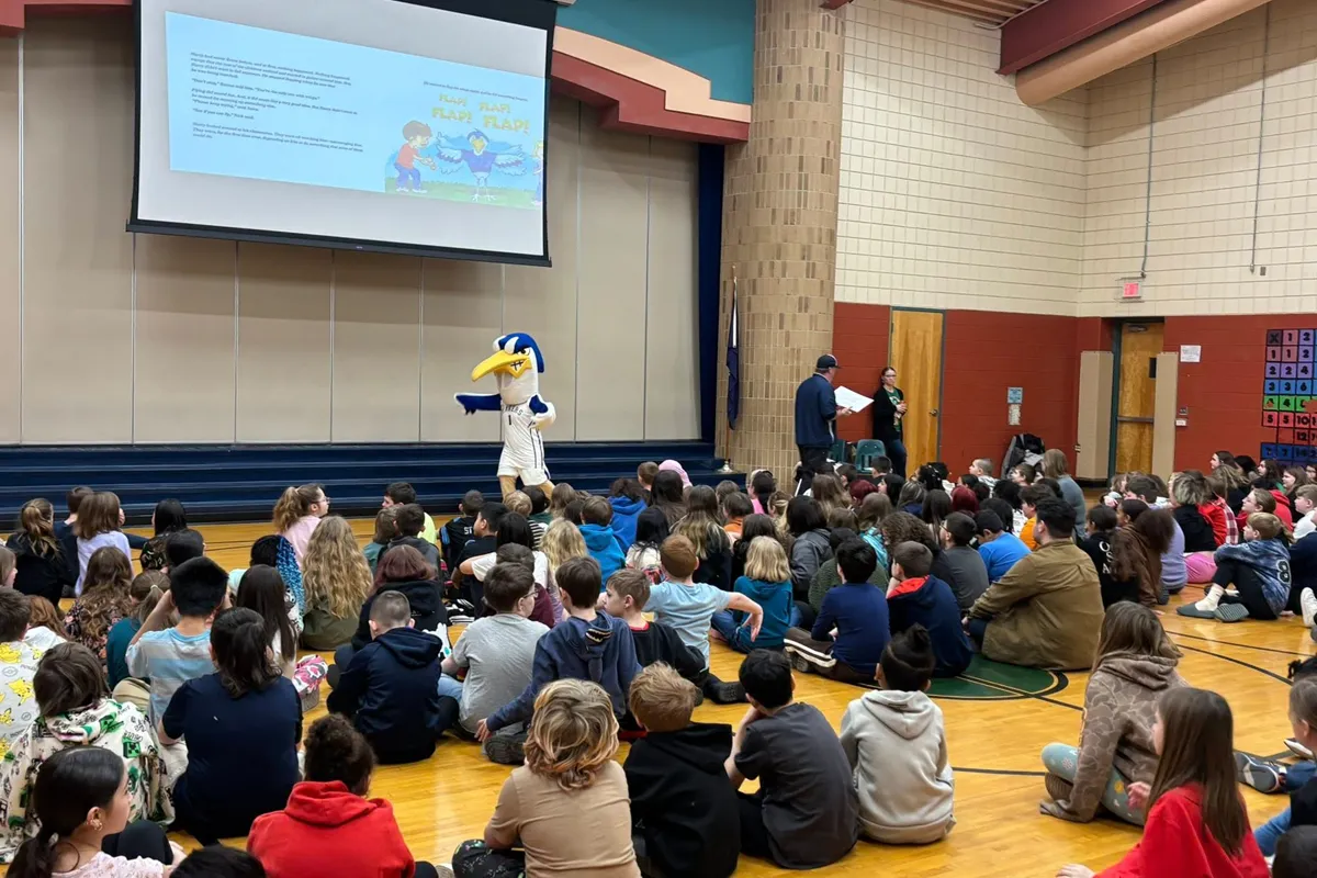 Mid staff read to local elementary and intermediate school students.