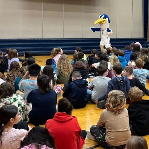 Mid staff read to local elementary and intermediate school students.