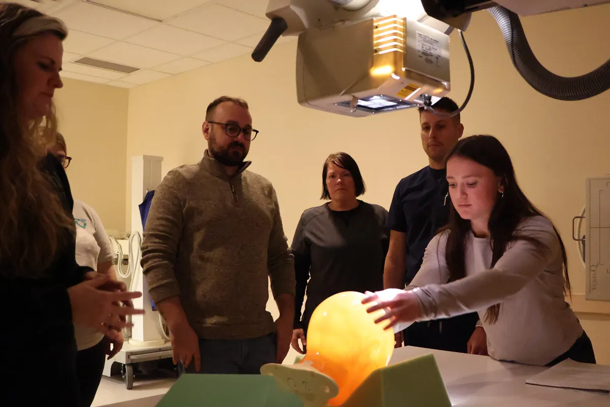 Students participate in a radiography course.
