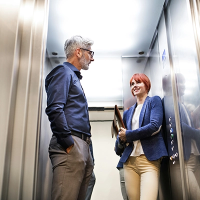 Student giving an elevator pitch to a potential employer